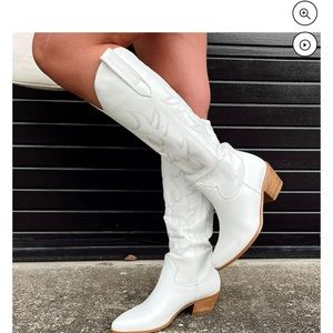 White cowboy boots size 10 never worn besides trying them on inside my house
